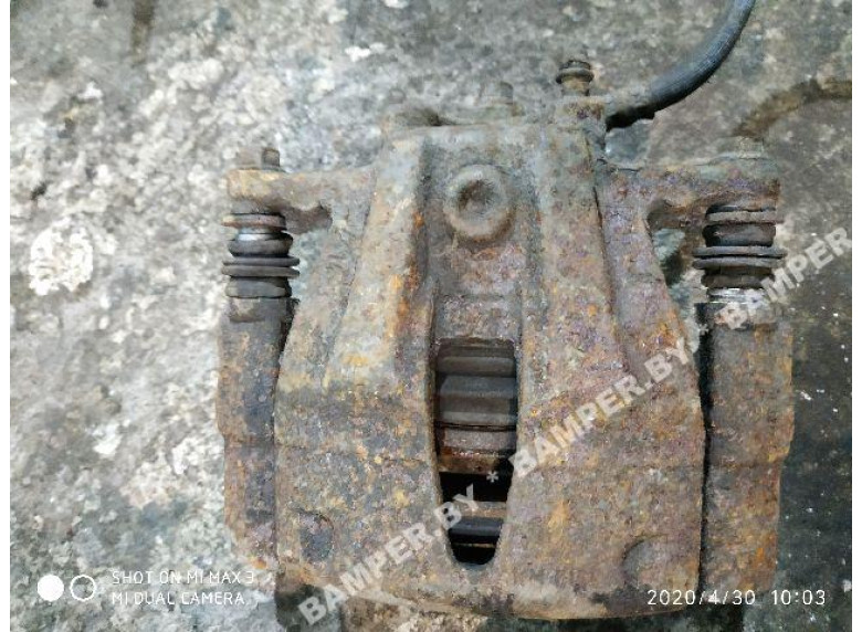 Суппорт передний левый к Opel Corsa, 2004г.