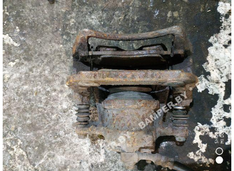 Суппорт передний левый к Opel Corsa, 2004г.