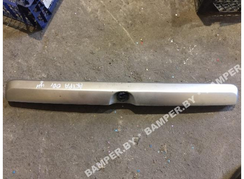 Накладка подсветки номера к Opel Astra, 2000г.