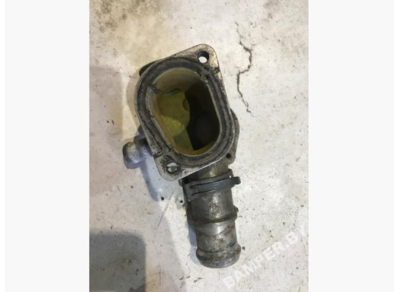 Фланец (тройник) системы охлаждения к Skoda Superb