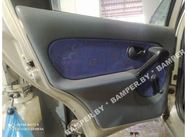 Обшивка двери (дверная карта) комплект к Fiat Palio, 2001г.