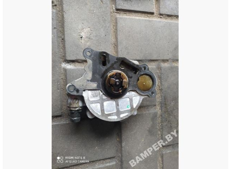 Насос вакуумный к Volkswagen Golf, 2009г.