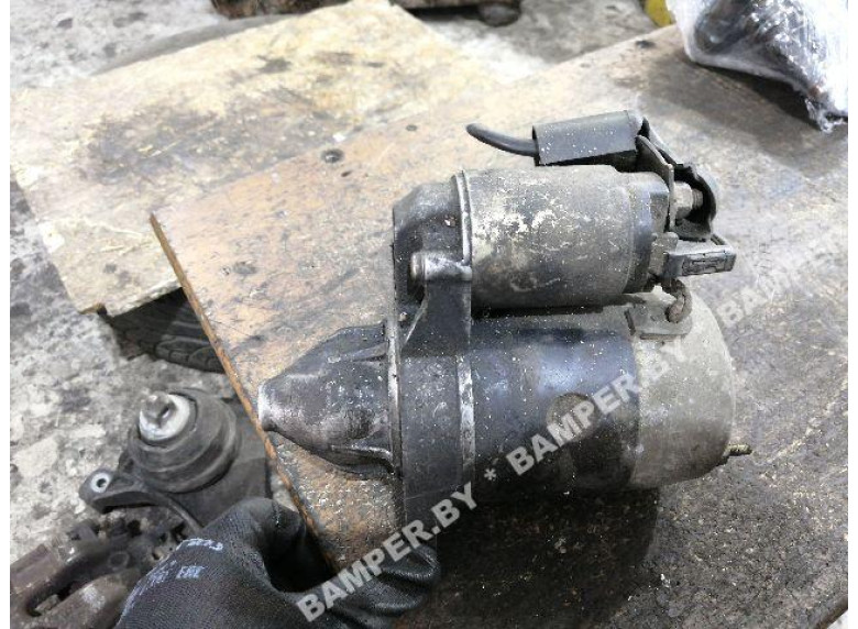 Стартер к Mazda 121, 1994г.