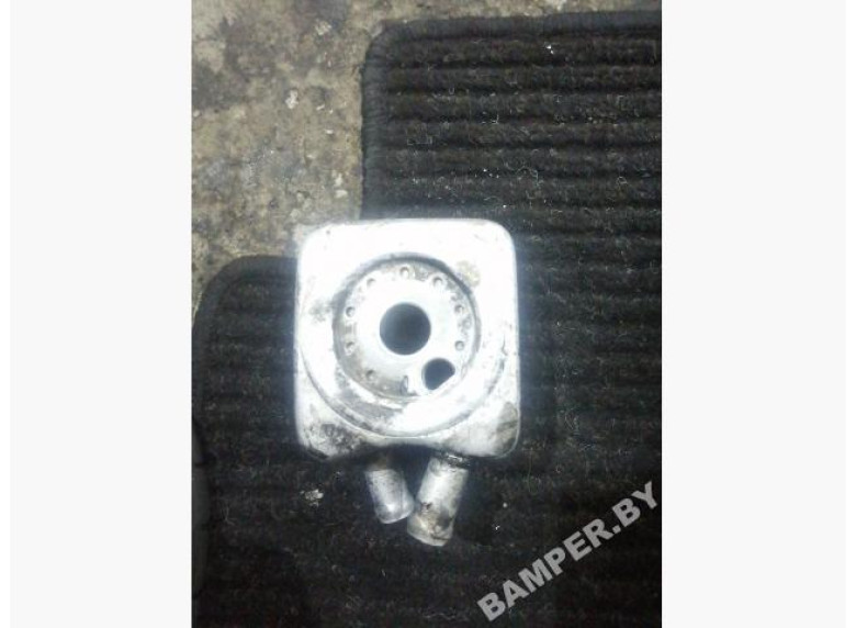 Теплообменник масляного фильтра к Volkswagen Caddy, 1999г.