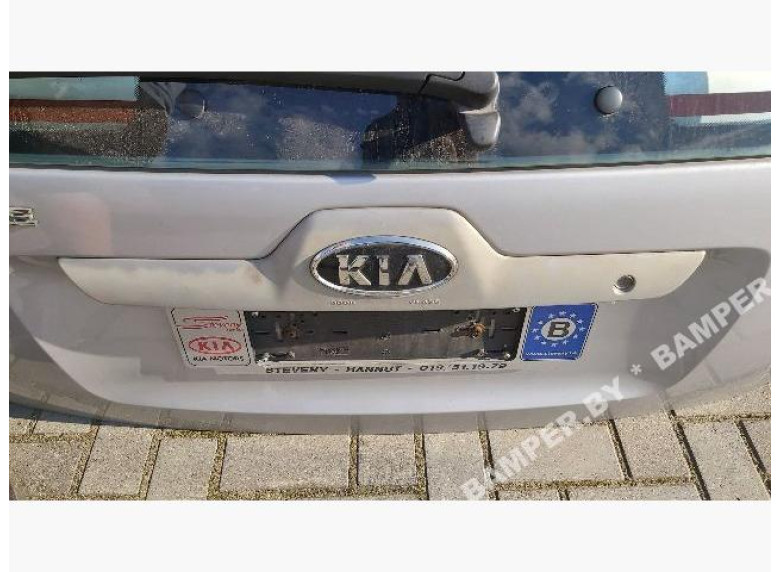 Накладка подсветки номера к Kia Sportage, 2004г.