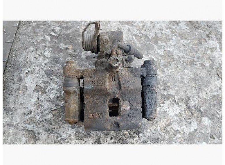 Суппорт задний правый к Chevrolet Spark