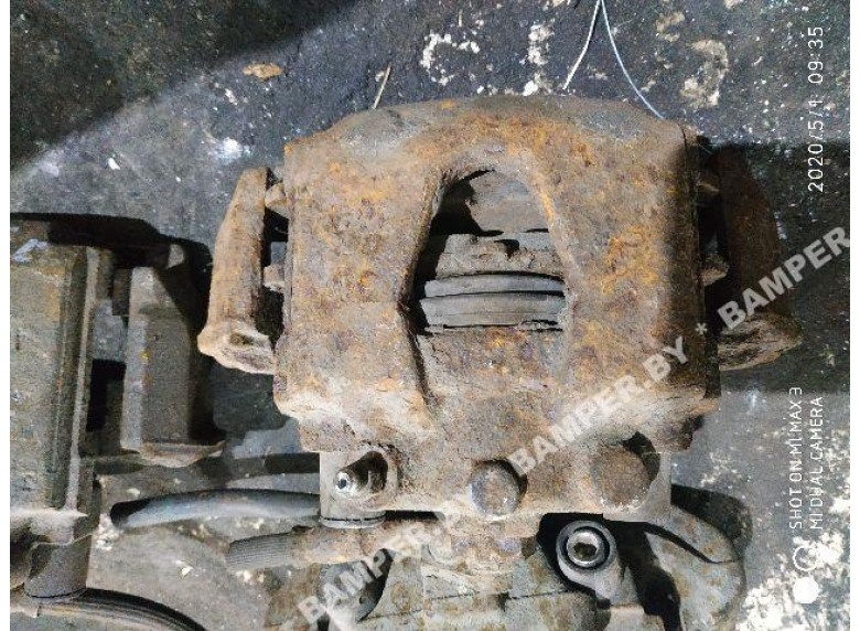 Суппорт передний левый к Opel Astra, 1995г.