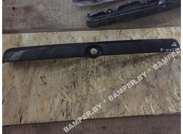 Накладка подсветки номера к Opel Astra