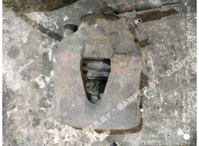 Суппорт передний левый к Volkswagen Golf, 1999г.