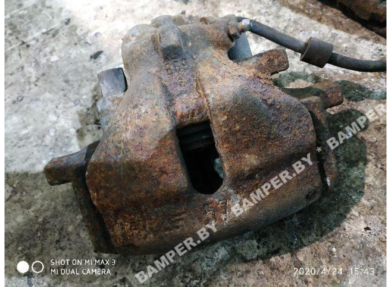 Суппорт передний левый к Volkswagen Sharan, 1998г.