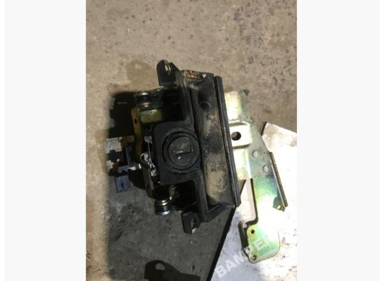 Замок багажника к Skoda Octavia