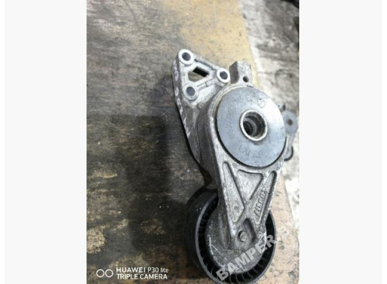 Натяжитель ремня генератора к Volkswagen Golf, 2000г.