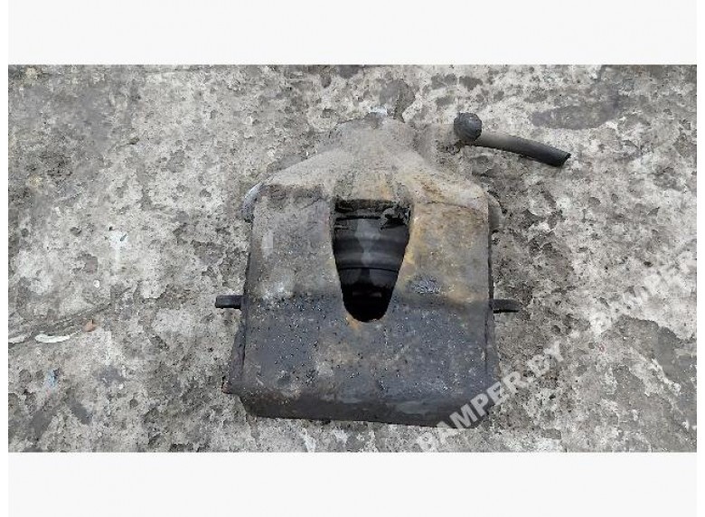 Суппорт передний левый к Volkswagen Caddy