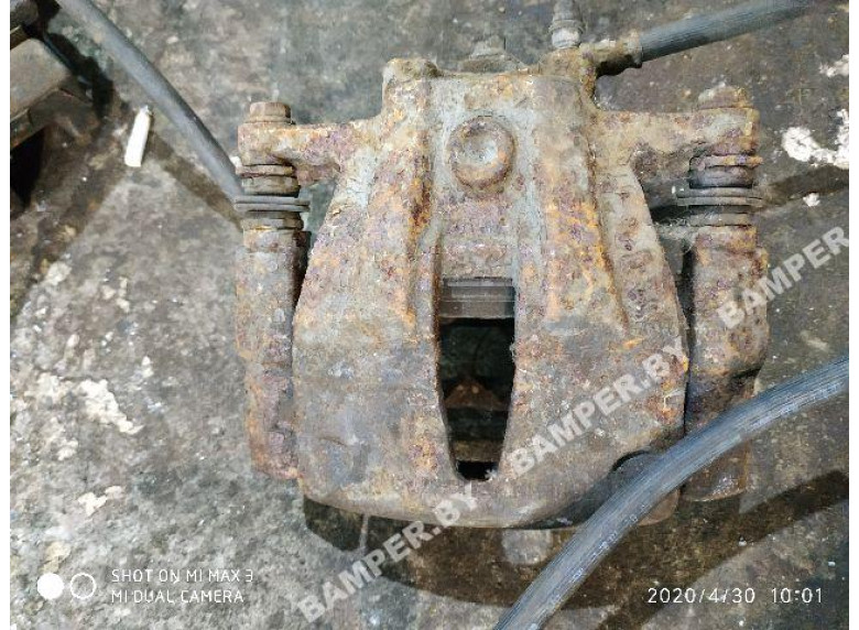 Суппорт передний левый к Opel Corsa, 2004г.