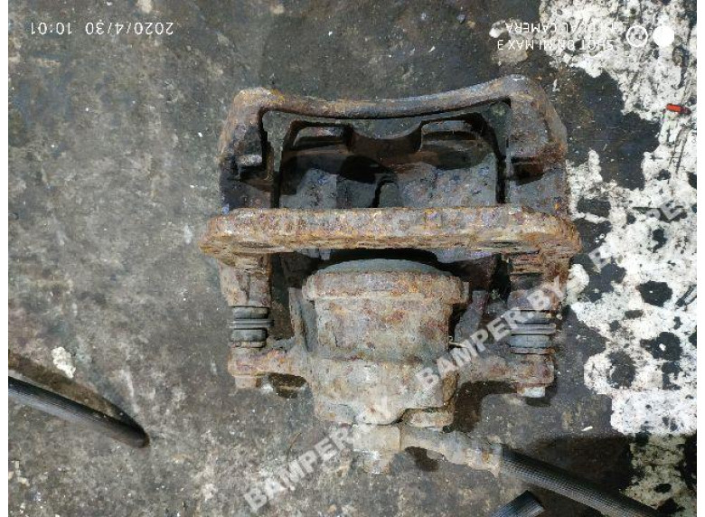 Суппорт передний левый к Opel Corsa, 2004г.