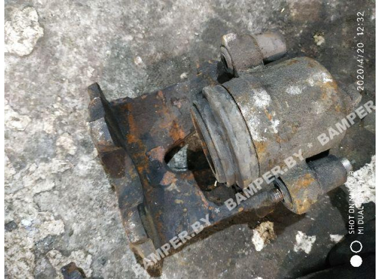 Суппорт передний правый к Skoda Octavia