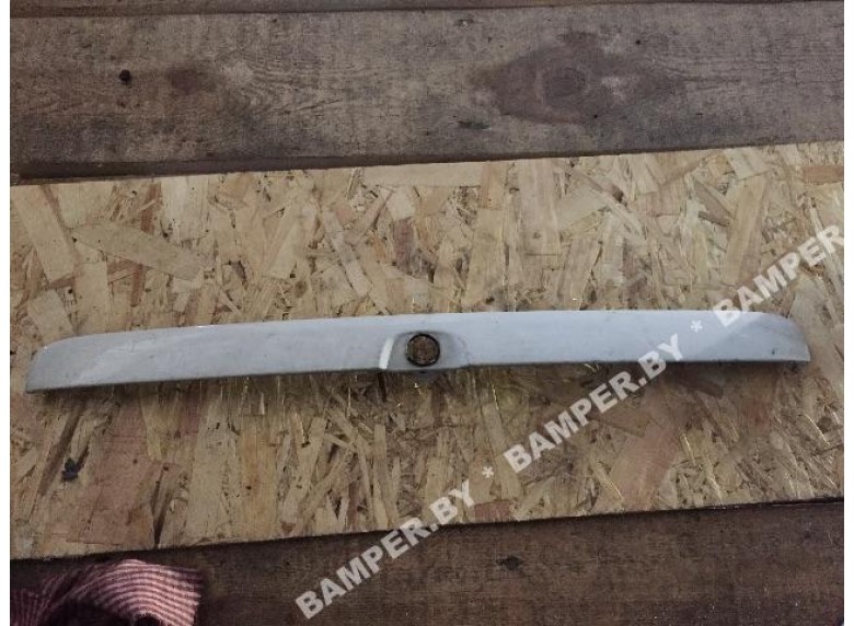 Накладка подсветки номера к Opel Astra