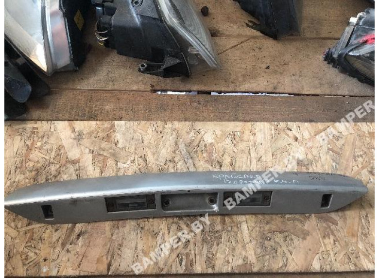 Накладка подсветки номера к Chrysler Voyager, 2002г.