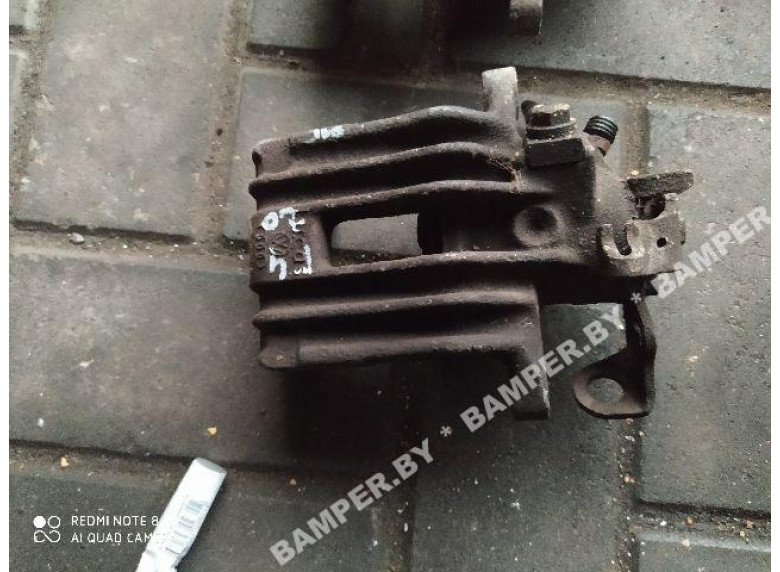 Суппорт задний левый к Volkswagen Golf, 2003г.