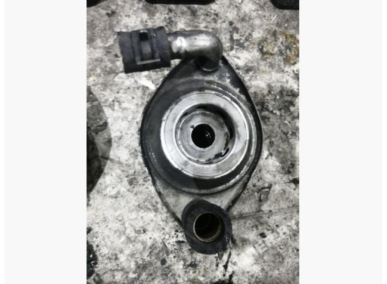 Теплообменник масляного фильтра к Mazda 626, 2000г.