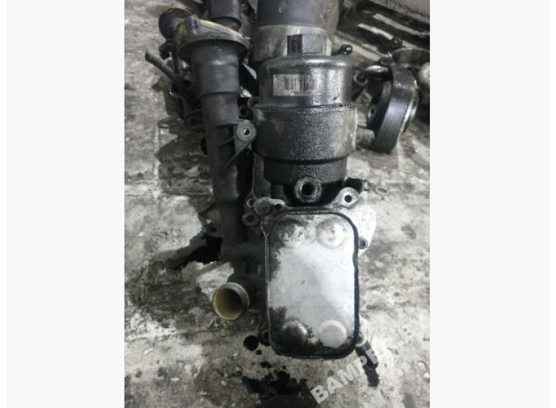 Теплообменник масляного фильтра к Opel Corsa, 2007г.