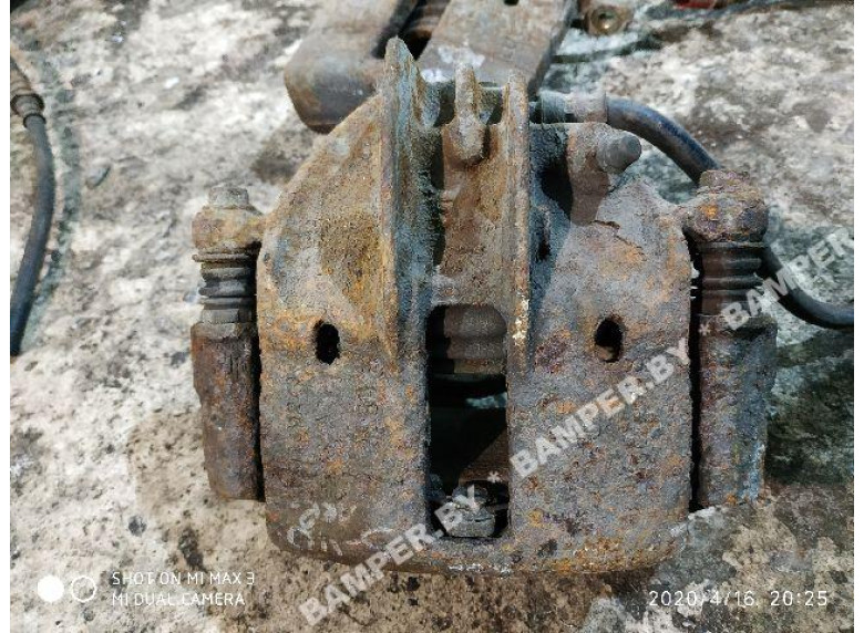 Суппорт передний левый к Volvo V40, 1999г.