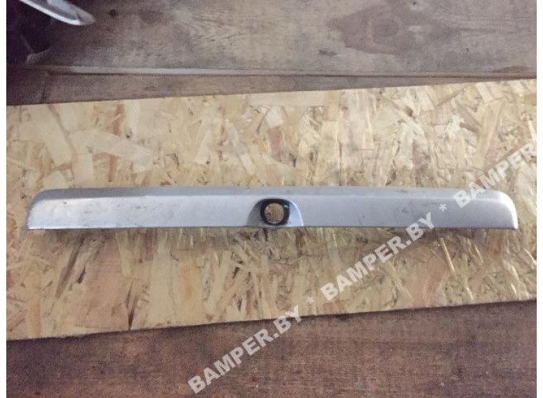 Накладка подсветки номера к Opel Astra