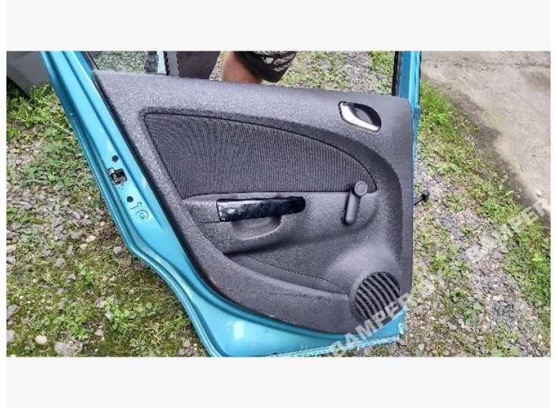 Обшивка двери (дверная карта) комплект к Opel Corsa, 2010г.