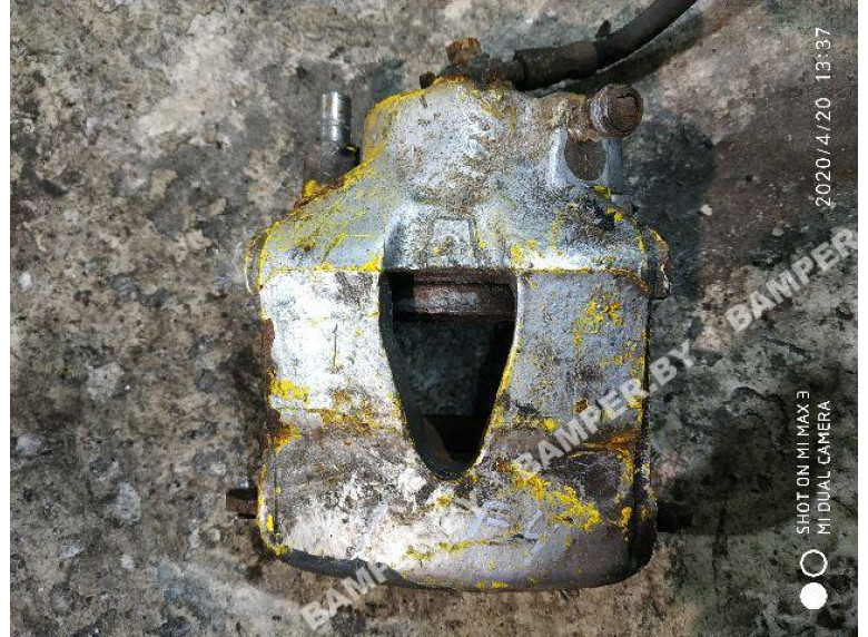 Суппорт передний левый к Volkswagen Golf, 1999г.