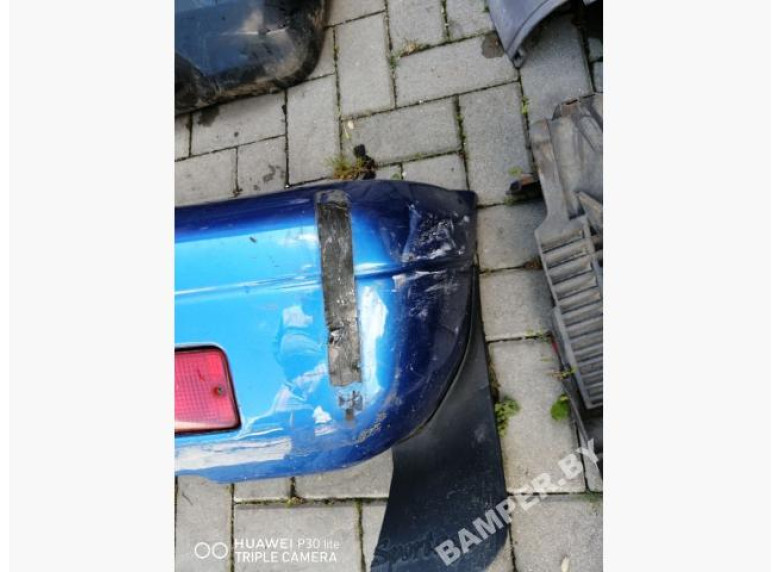 Бампер задний к Kia Sportage, 2001г.