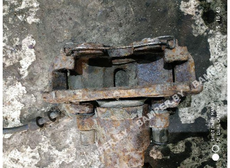 Суппорт передний левый к Ford Mondeo