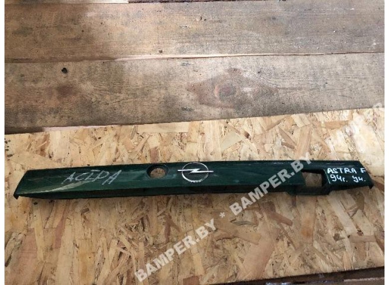 Накладка подсветки номера к Opel Astra