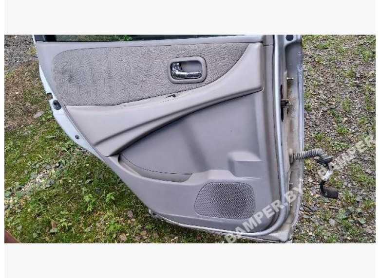 Обшивка двери (дверная карта) комплект к Nissan Almera Tino, 2001г.