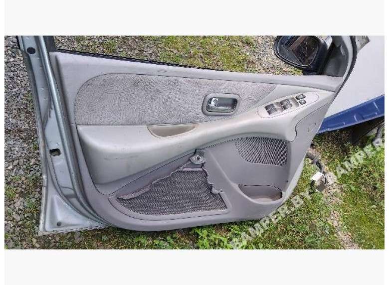 Обшивка двери (дверная карта) комплект к Nissan Almera Tino, 2001г.