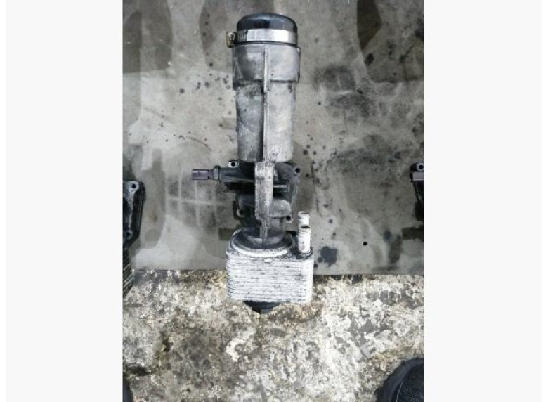 Теплообменник масляного фильтра к Volkswagen Golf, 2003г.