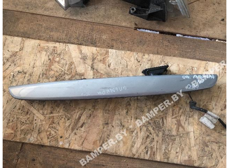 Накладка подсветки номера к Nissan Almera, 2000г.