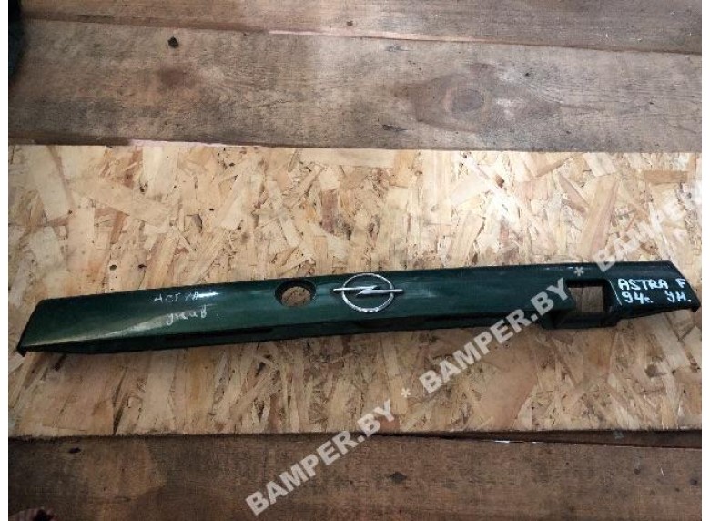 Накладка подсветки номера к Opel Astra