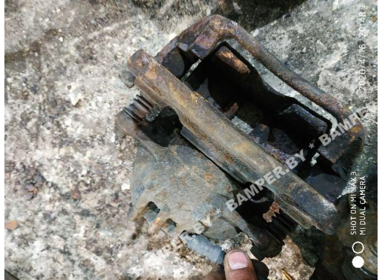 Суппорт передний левый к Volvo V40, 1999г.