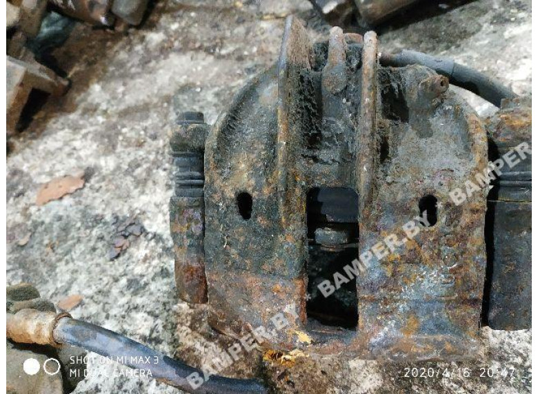 Суппорт передний левый к Volvo V40, 1999г.