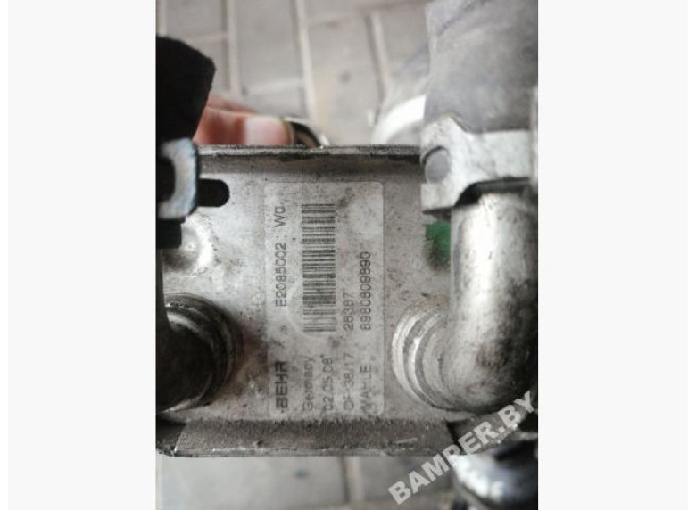 Теплообменник масляного фильтра к Opel Astra, 2009г.