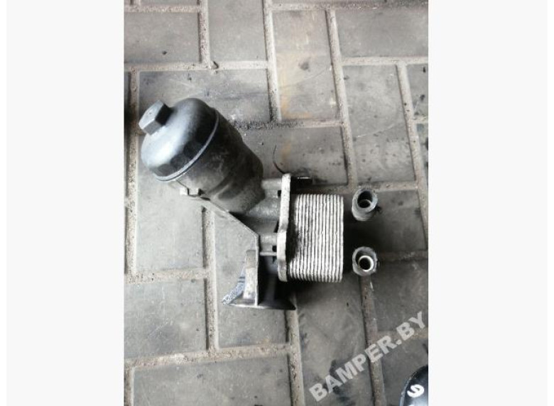 Теплообменник масляного фильтра к Opel Astra, 2009г.