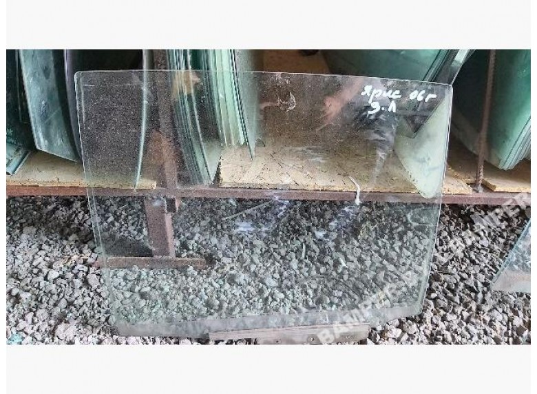 Стекло двери задней левой к Toyota Yaris