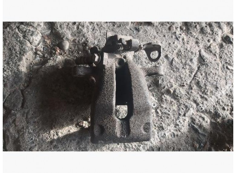 Суппорт задний левый к Opel Astra