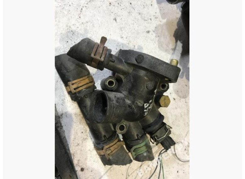 Корпус термостата к Volvo V40, 2001г.