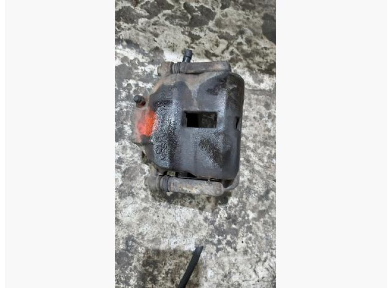 Суппорт передний левый к Nissan Almera