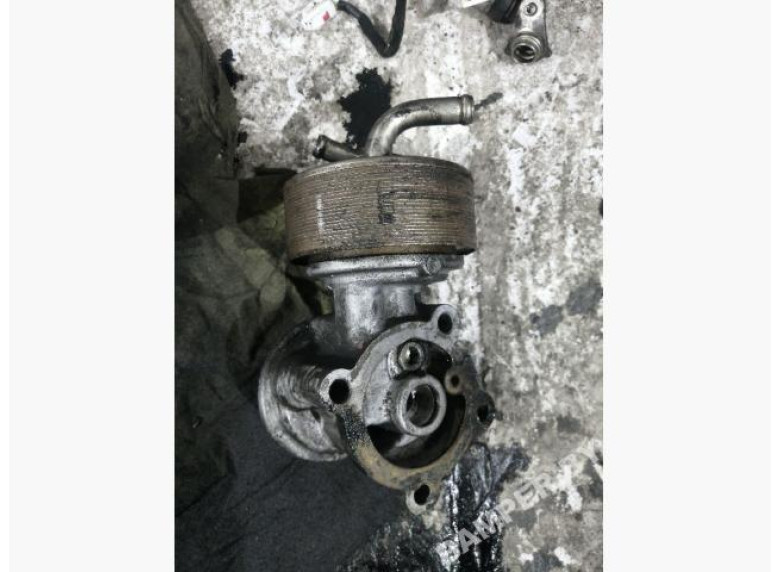 Теплообменник масляного фильтра к Nissan Primera, 1999г.