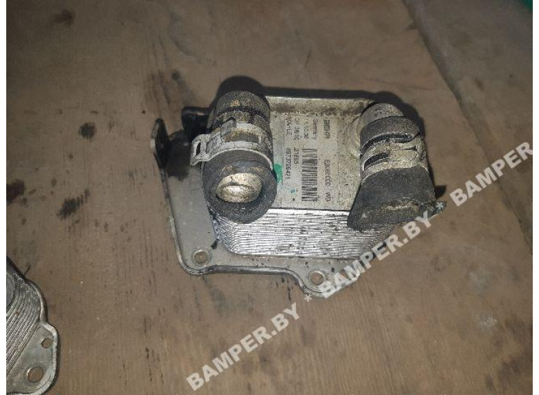 Теплообменник масляного фильтра к Opel Astra, 2004г.