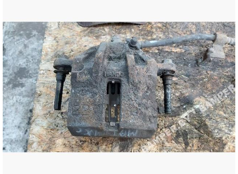 Суппорт передний левый к Hyundai Matrix