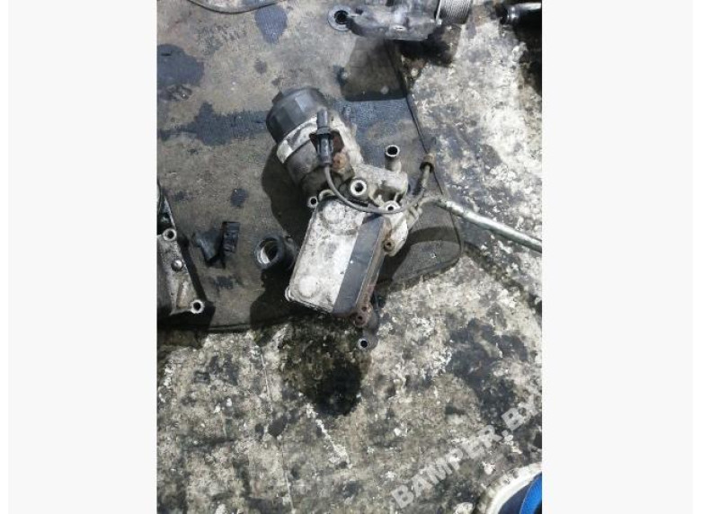 Теплообменник масляного фильтра к Opel Astra, 2011г.