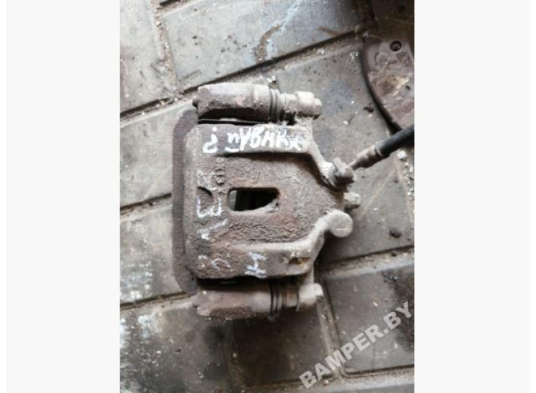 Суппорт задний левый к Hyundai H1, 2011г.